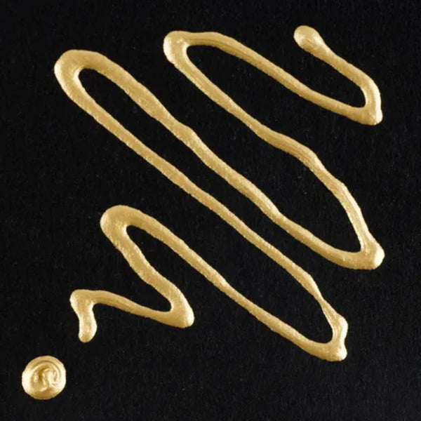 Gold drizzle on a black background