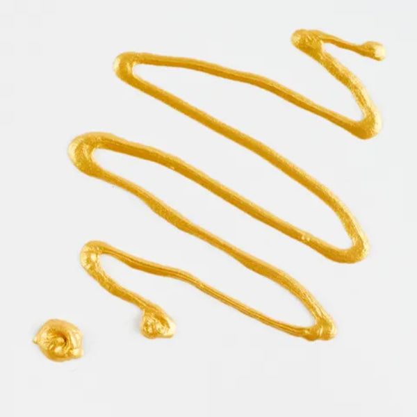 Drizzle of mustard on a white background