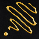 Gold drizzle on a black background