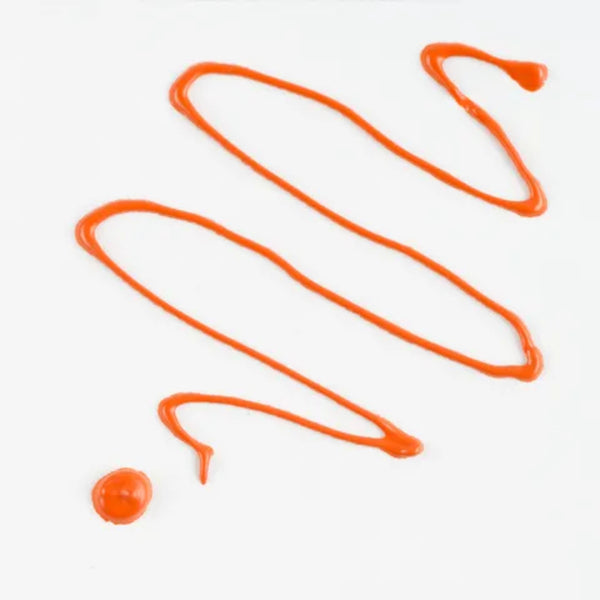 Orange drizzle and droplet on a white background
