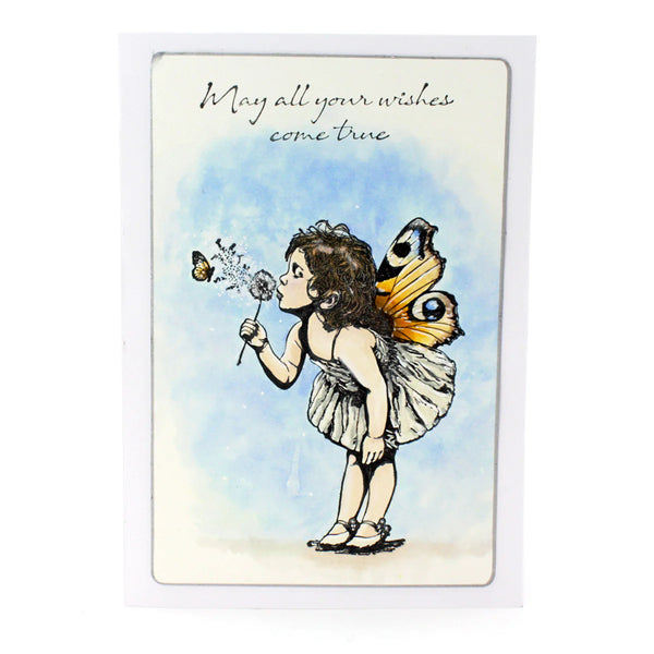 Card with fairy blowing dandelion against a blue sky, featuring text 'May all your wishes come true'.