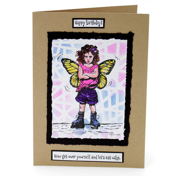 Birthday card with a colorful illustration of a girl with butterfly wings on a brown envelope.