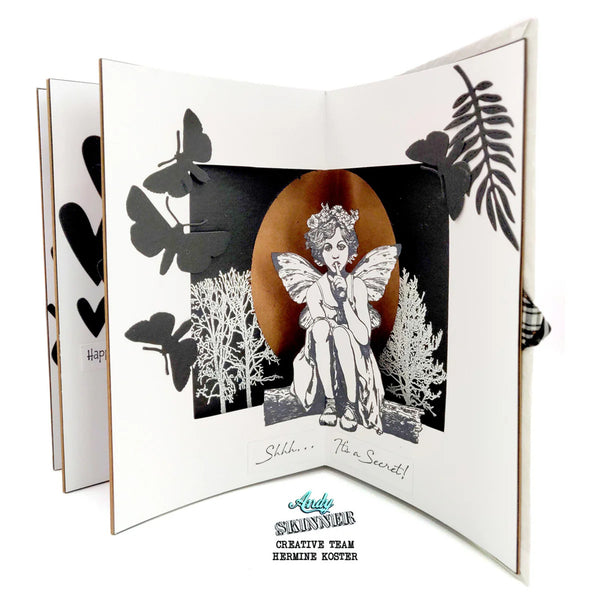 Fairy-themed pop-up card with black and white illustrations and butterflies on a white background.