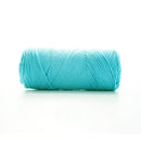 Turquoise skein of yarn on a white background