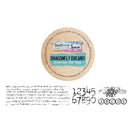 Round packaging for 'Dragonfly Dreams' kiss-cut paper tape with text and numbers on a white background