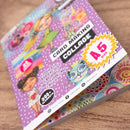 Card making collage kit with colorful design on a wooden surface
