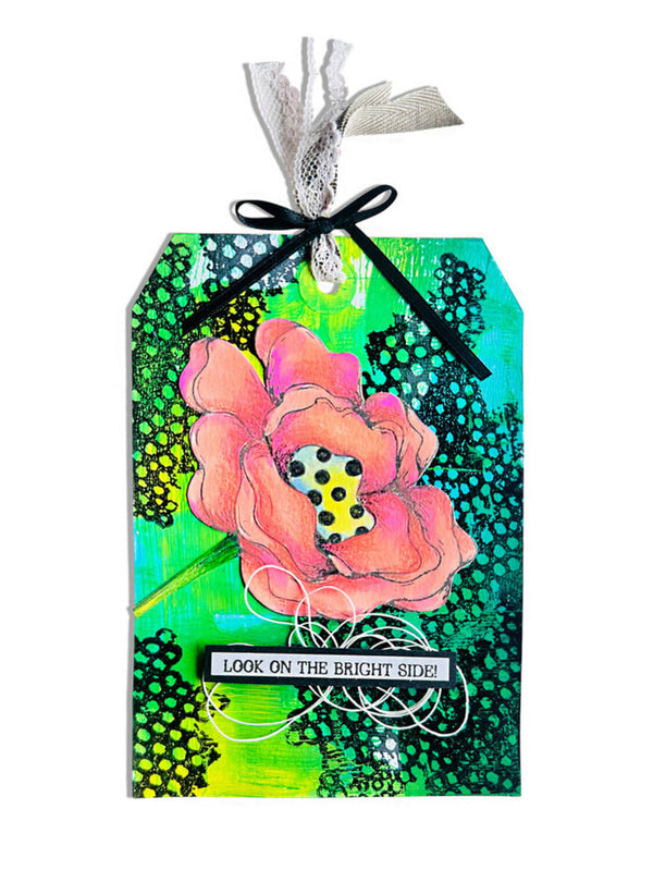 Decorative tag with a pink flower and text 'Look on the bright side!' on a colorful background.
