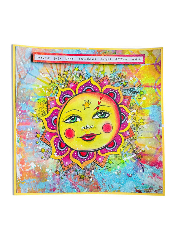 Colorful sun illustration with artistic design elements on a white background