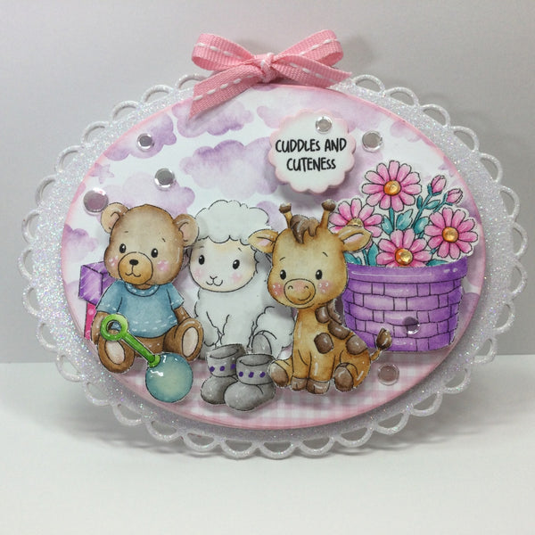 Decorative card with teddy bear, sheep, and giraffe illustration, surrounded by flowers and a pink bow.