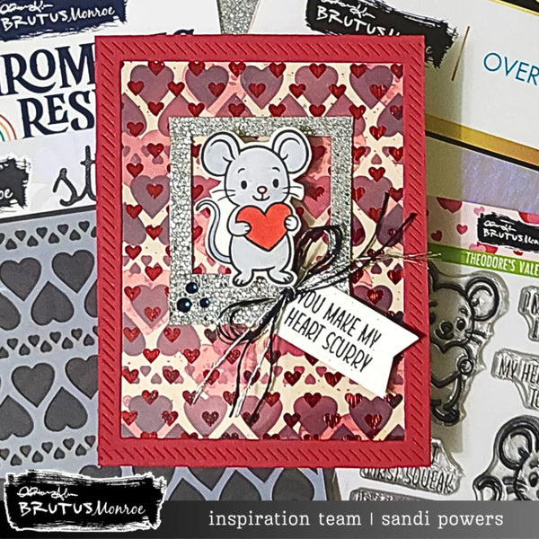 Valentine's Day card with a mouse holding a heart and text 'You make my heart scurry' on a heart-patterned background.