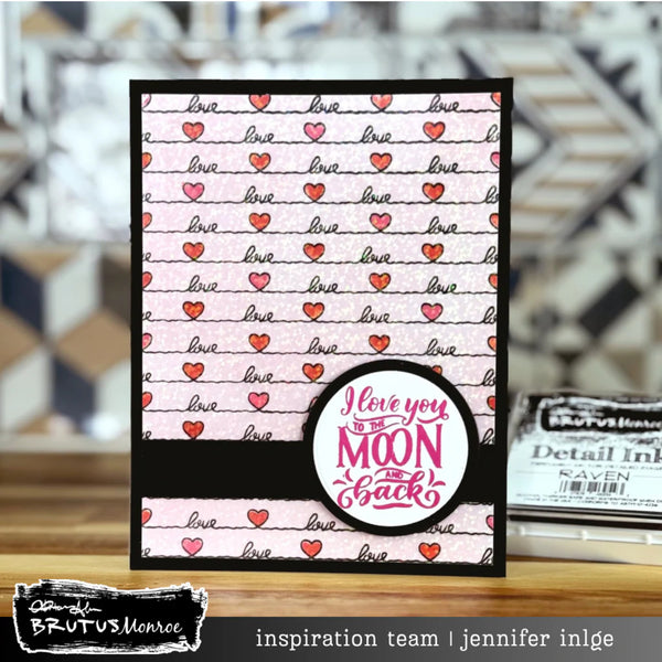 Card with 'I love you to the moon and back' text and heart patterns on a blurred background
