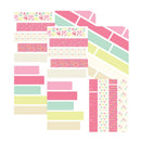 Collection of colorful washi tape strips with various patterns on a white background