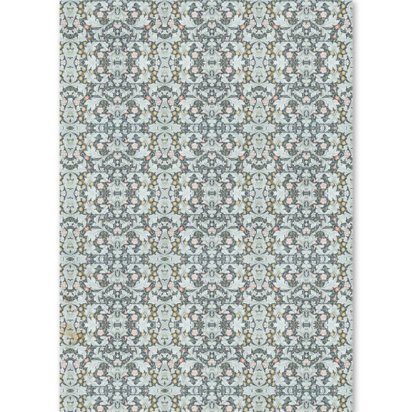 Patterned rug with a geometric design on a light blue background
