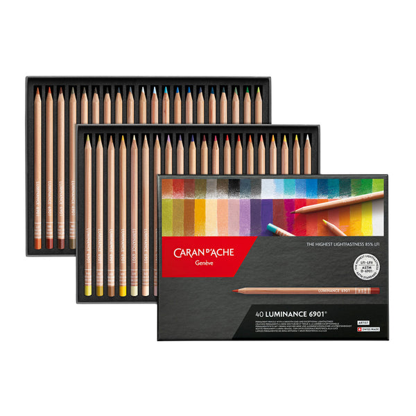 Set of Caran d'Ache Luminance colored pencils with packaging on a white background