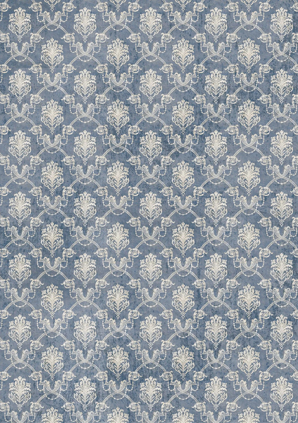 Patterned fabric with a blue and white design on a blue background