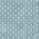 Patterned fabric with white floral design on a blue background