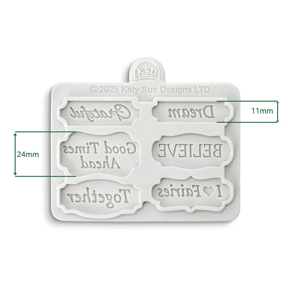 Silicone mold with engraved text on a white background