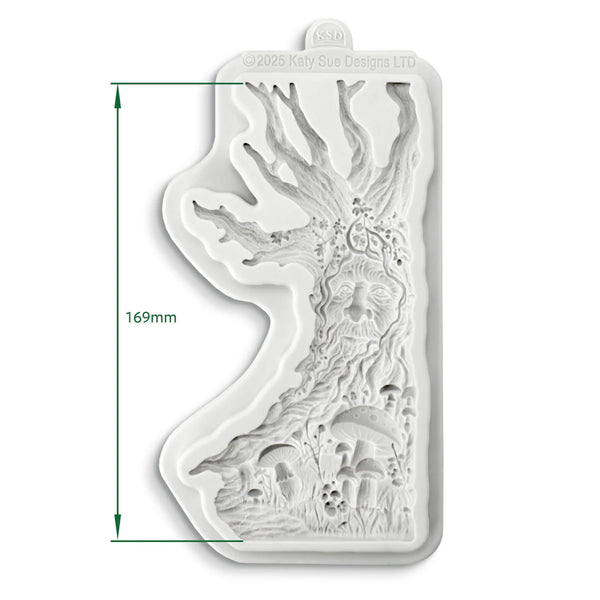 Silicone mold with tree and face design, showing dimensions on a white background