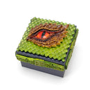 Decorative box with dragon eye design on a white background
