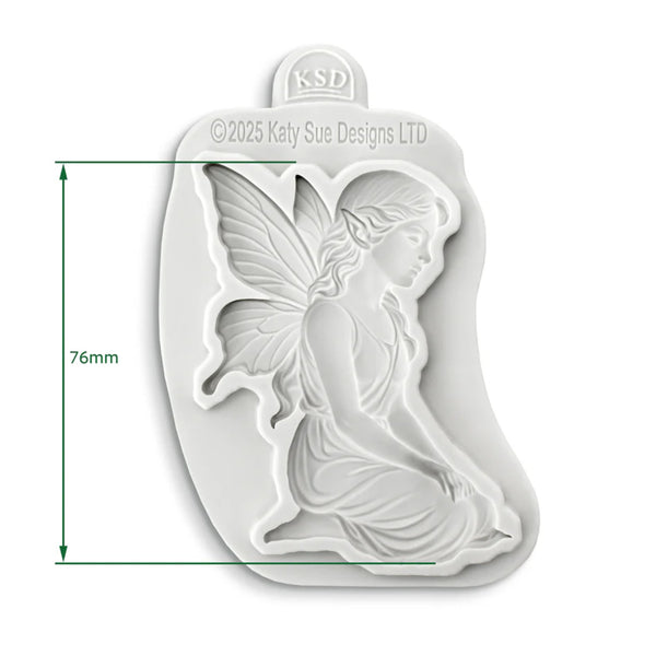 Silicone mold of a fairy with dimensions and Katy Sue Designs logo on a white background