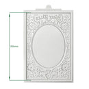 Decorative white card with floral patterns and measurements on a white background