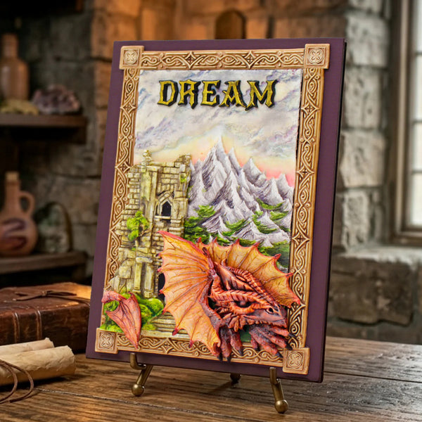 Decorative plaque with a dragon and mountain scene on a stand, against a stone wall background.