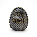 Decorative egg with 'Fly High' text on a white background