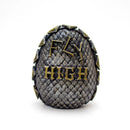 Decorative egg with 'Fly High' text on a white background
