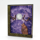 Decorative book cover with a wolf and moon design on a purple starry background