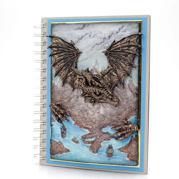 Notebook with dragon design on a map cover
