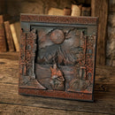 Decorative wall art with a wolf and mountain scene on a wooden surface