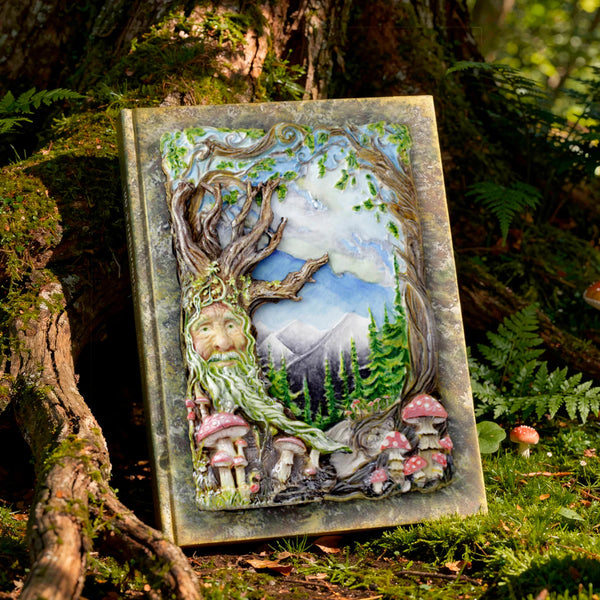 Decorative plaque with nature-themed design in a forest setting
