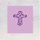 Decorative cross with floral elements on a purple background
