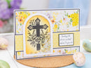 Greeting card with floral design and cross on a decorative stand.