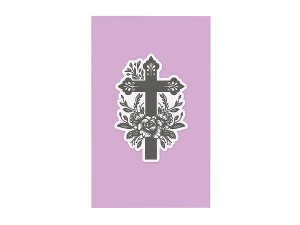 Decorative cross with floral elements on a purple background