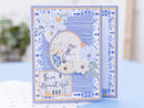 Greeting card with decorative border and mouse illustration on a blue background
