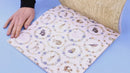 Sheet of paper with animal pattern on a blue surface