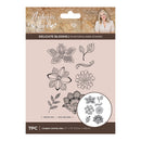 Packaging of 'Antique Lace' Delicate Blooms photopolymer stamps with floral designs on a beige background.