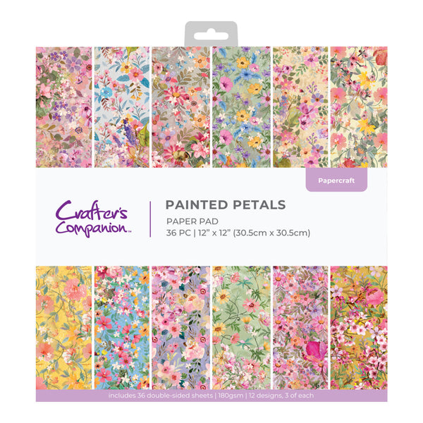 Packaged paper pad with floral designs by Crafters Companion on a white background