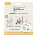 Packaging of 'Wildwood Whimsy' ephemera pack with pre-cut die-cut pieces on a beige background.