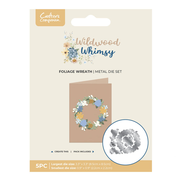 Package of Wildwood Whimsy foliage wreath metal die set with floral design on beige background