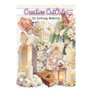 Packaging of 'Creative Cut Outs' with flowers, candles, and butterflies on a white background