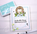 Card with a hedgehog design and floral elements, featuring 'gina k' products on a white background.