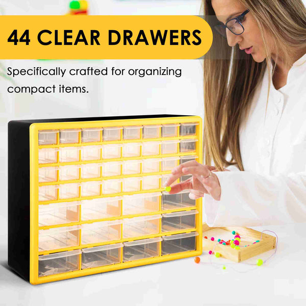 Yellow organizer with clear drawers being used by a person, text indicating '44 Clear Drawers' and 'Specifically crafted for organizing compact items'.