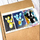 Collage of cactus paintings on a textured surface