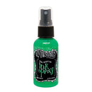 Green ink spray bottle with black cap on a white background