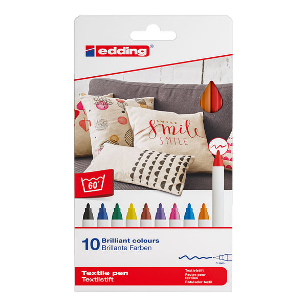Packaging of edding textile pens with colorful tips on a couch background