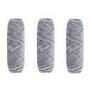 Three skeins of gray yarn on a white background