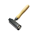 Brayer with a wooden handle on a white background