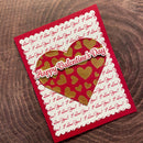 Valentine's Day card with red and gold heart design on a wooden surface